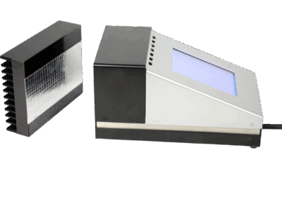 TIR100-2 emissometer beside its black measuring head, revealing the internal thermopile sensor used for emissivity readings.